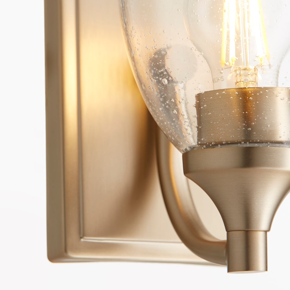 Enclave 1 Light Transitional Aged Brass Clear Seeded Glass Wall Sconce