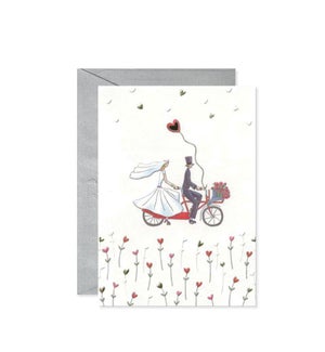 Bride and Groom on Bicycle