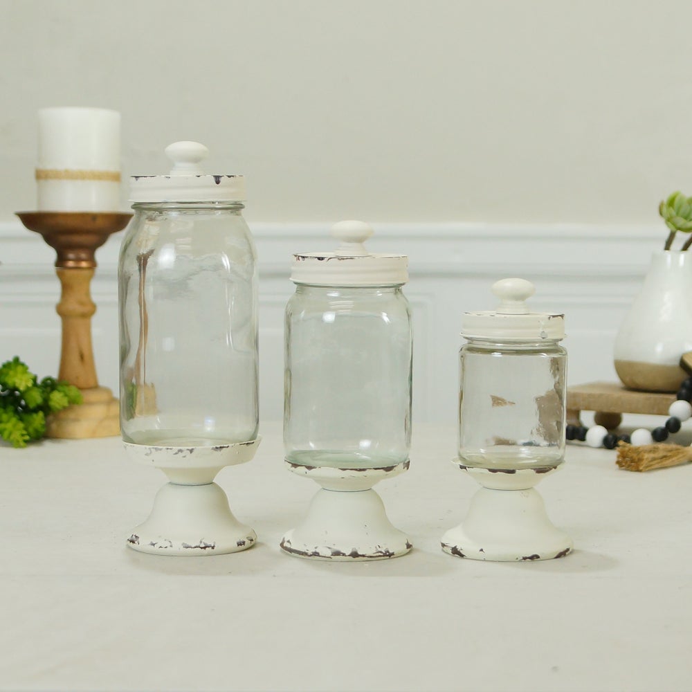 Set of 3 Decorative Glass Canisters With Silver Scroll Lids