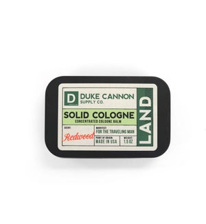Land Solid Cologne - Scent: sandalwood, amber, citrus, rosemary, and clove..