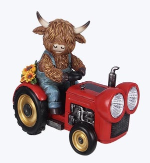 Resin Solar Light Highland Cow on Farm Tractor