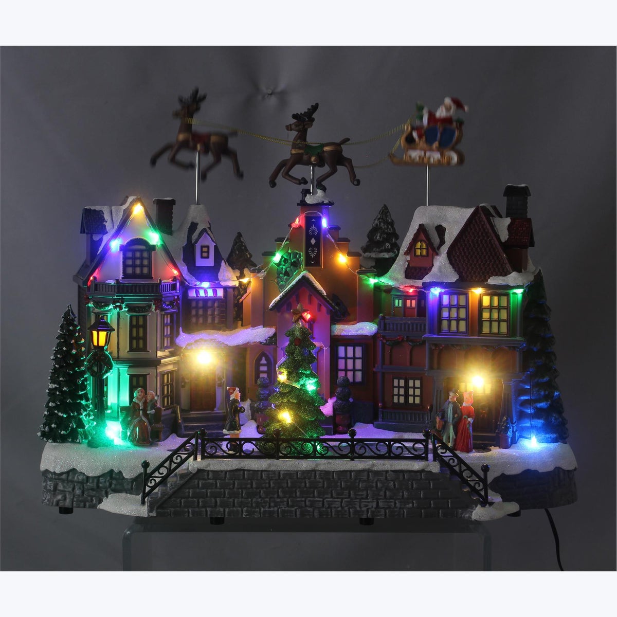 Resin Traditional Christmas Tabletop Battery Operated Village Santa on Sled with LED Decor