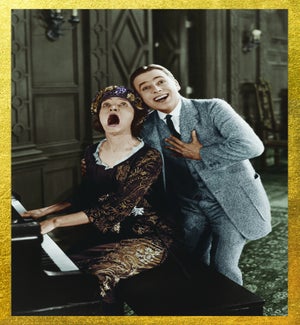AN/Couple By Piano